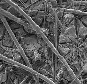 Clean air-oil separator media (left) versus contaminated media (right)